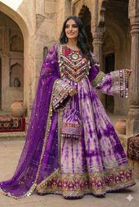 Graceful Woman Showcasing A Delicate Blush Pink Tie Dye Ethnic <b>Maxi</b> <b>Dress</b> Adorned With Exquisite Multicolor Mirror Work Patches - Product Image 3