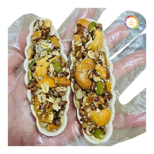 Galleta Nut Boat con Mezcla de Frutos Secos Tostados con Cuidado y Base de Galleta Crujiente, Diseñada para un Empaque y Exhibición Convenientes - Product Image 1