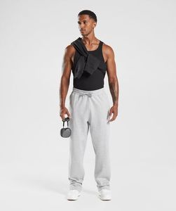 Pantalones de chándal de gran tamaño con logotipo personalizado Pantalones de chándal holgados de pierna ancha de alta calidad para hombres, pantalones básicos lisos de talla grande - Product Image 4