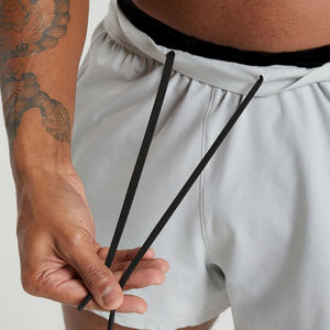 Pantalones cortos casuales de gimnasio para hombre para entrenamiento y correr de secado rápido y ecológicos con bolsillos Diseño de patrón sólido en oferta - Product Image 3