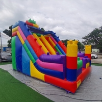 Château gonflable combiné avec toboggan et blocs de construction gonflables 6MX4M pour enfants OEM