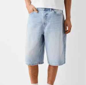 กางเกงยีนส์ทรงหลวมใช้ได้ทุกเพศในหลากหลายสไตล์ | กางเกงขาสั้นฤดูร้อนมีสไตล์พร้อมกางเกงขาสั้นขนาดใหญ่ที่มีสไตล์สำหรับสวมใส่ในชีวิตประจำวัน - Product Image 4