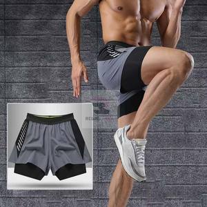 Pantalones cortos atléticos de doble capa unisex, cierre de cintura elástica, patrón sólido ecológico, decoración de encaje de poliéster, servicio OEM - Product Image 6