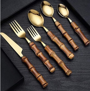 Modern Stainless Steel and Wooden Cutlery Set Crafted for Unique <b>Table</b> Decor and Functional Use - Product Image 1