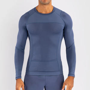 Vente en gros Rashguard en spandex imprimé personnalisé avec logo à manches longues Protection solaire sublimée Concevez votre propre équipement MMA - Product Image 1