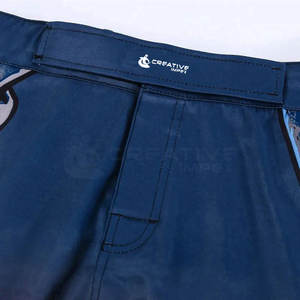 กางเกงชกมวย MMA ระดับมืออาชีพ สกรีนโลโก้ได้ แห้งเร็ว ระบายอากาศดี คุณภาพสูง ผ้าสี่ทิศทางยืดได้ สำหรับชุดศิลปะการต่อสู้ ผลิตในปากีสถาน - Product Image 4