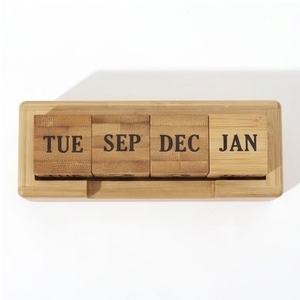 This handcrafted wooden desktop <b>calendar</b> is a reusable and eco-friendly office accessory - Product Image 4