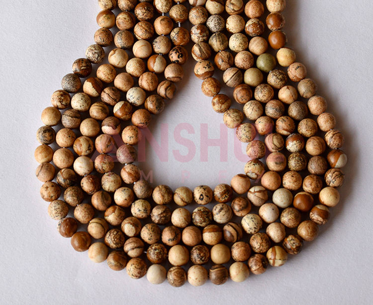 Brown, Tan, Cream, and Hints of Green or Gray