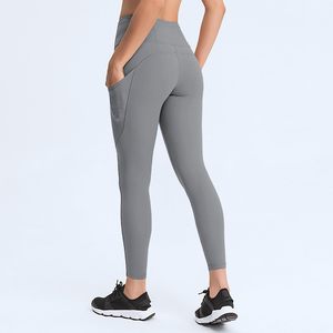Pantalon athlétique taille haute Compression Fit poches intérieures contrôle du ventre Leggings brillants pour femmes pantalon Disco Yoga sport Legging - Product Image 4