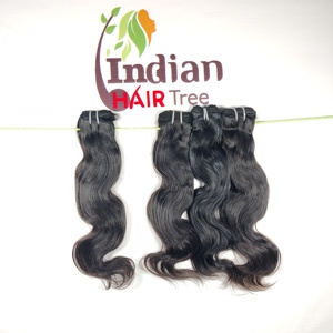 Extensiones de cabello humano de estilo ondulado natural para mujer india, extensiones de cabello humano de trama sin procesar de color negro de proveedor - Product Image 1