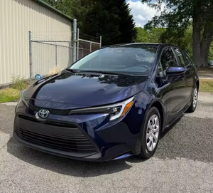 Corolla Hybride LE FWD 2024 Noire avec Sièges en Tissu, Moteur Hybride, Transmission Automatique, Bluetooth, CarPlay, Jantes en Acier, Conduite à Gauche - Product Image 1