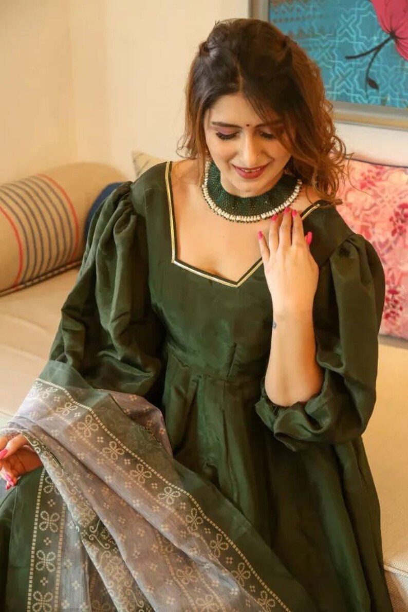 Elegant Indian Dark Green Party Wear Gown for Women with Pluffy Sleeves & Organza Dupatta - Perfect for Bridal Weddings Elegant Indian Dark Green Party Wear Gown for Women with Pluffy Sleeves & Organza Dupatta - Perfect for Bridal Weddings