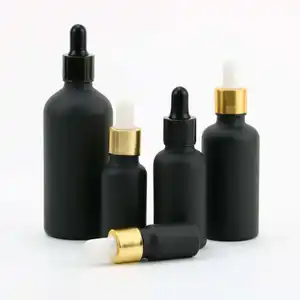 O logotipo customizável luxuoso 5ml10ml15ml20ml30ml50ml100ml preto fosco vidro garrafa de óleo essencial com caixa