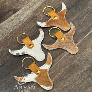 OEM personalizado de lujo de pelo en cuero de vaca llavero estilo vaquero cabeza de toro llavero mini personalizado con llaveros redondos de metal - Product Image 1