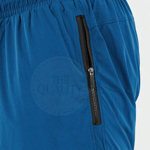 กางเกงขาสั้นลำลองสำหรับผู้ชายกางเกงสตรีทแวร์ผ้าคอตตอน100% สีพื้นดีไซน์ตามสั่งสไตล์ล่าสุด - Product Image 5