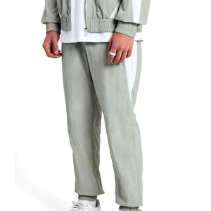 ชุดวอร์มไนลอนคุณภาพสูงแบบขายส่ง ซิปหน้า ระบายอากาศได้ดี เหมาะสำหรับกิจกรรมกลางแจ้ง ชุดลำลองสำหรับทุกเพศทุกวัย สำหรับฤดูหนาว ปี 2026 - Product Image 2