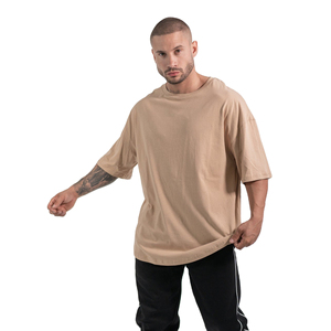 เสื้อยืดผ้าฝ้ายวินเทจสำหรับผู้ชายทรงหลวมแขนสั้นลำลองสีพื้น - Product Image 1