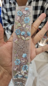 Custom made on beige <b>net</b> base <b>fabric</b> with multi coloured floral design with sequence work for ladies garments and resale. - Product Image 2