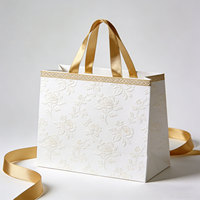 Sacs en papier kraft de luxe durables avec logo personnalisé en gros, sacs de courses pour supermarchés, pour l'emballage de chaussures et de vêtements