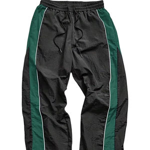 Pantalons de survêtement sportifs à jambes larges pour femmes personnalisés, pantalons parachute amples, pantalons de survêtement en nylon rayé, pantalons rayés teints en uni, décontractés - Product Image 6