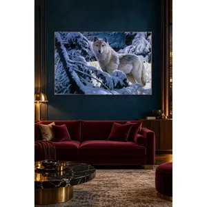 Impression sur toile de Fida Wolf parmi les branches de pin enneigées - Product Image 1