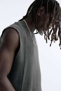 เสื้อเชิ้ตทรงหลวมใส่ได้ทั้งชายและหญิงฟอกสีไม่มีแขนเสื้อโอเวอร์ไซส์ - Product Image 6