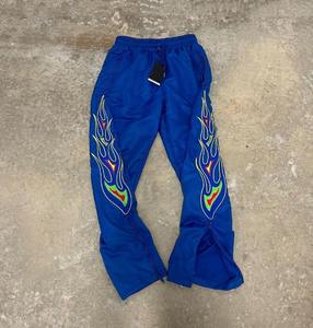 Cortavientos de calle con bordado y logotipo personalizado para hombre, pantalones impermeables transpirables, parte inferior abierta, poliéster, nailon, pista acampanada - Product Image 3