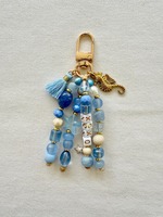 Porte-clés artisanal avec nom céleste, breloque de sac perlée noir et or, porte-clés personnalisé avec pompon et breloques lune et étoile, cadeau sur mesure