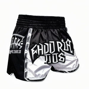 Shorts de sport MMA personnalisés haut de gamme pour hommes, en satin noir et blanc, taille haute, avec cordon de serrage, écologiques, élastiques et à séchage rapide - Product Image 1