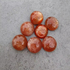 พลอยซันสโตนสีฟ้าทรงกลมแบบคาโบชอง ขัดเงา พร้อมเอฟเฟกต์เปลี่ยนสี AMAN GEMS ขายส่งจำนวนมาก สำหรับทำเครื่องประดับ ของขวัญสำหรับเธอ - Product Image 1