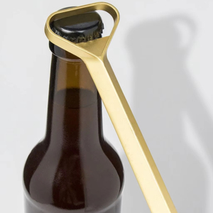 Abrebotellas de hierro fundido montado en la pared único con acabado rústico vintage perfecto para bares, restaurantes y cocinas - Product Image 1