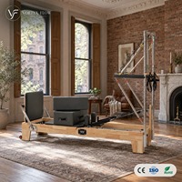 Reformer Pilates en bois de chêne, couleur personnalisée, avec barre de repose-pieds réglable et demi-tourne, durable, pour salles de sport et clubs de fitness, directement de l'usine
