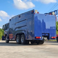 Camion de sauvetage et de lutte contre les incendies SINOTRUK Howo 6x4 LHD 400HP 10CBM, camion anti-explosion avec lame de bulldozer, bleu