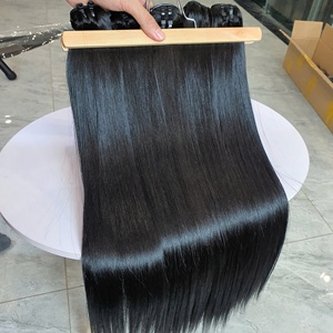 Venta al por mayor 100% Paquete de pelo crudo vietnamita azabache doble trama negra para mujeres estilo ondulado Color negro azabache pelo humano origen Vietnam - Product Image 3