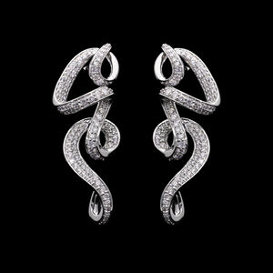 Boucles d'oreilles à boucle torsadée artistique en or 14 carats avec diamants naturels étincelants, serti de pavés brillants - Product Image 1