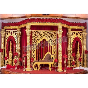 Tamilian Wedding Golden Dev Pillars Stage Decor South Indian Wedding Reception Stage Grandeur Wedding Stage With Dev Pillars USA - Product Image 1