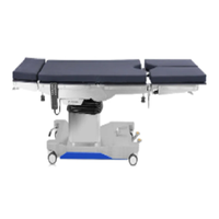 Table d'opération chirurgicale hospitalière avec sections et supports de bras réglables pour interventions de chirurgie générale et ophtalmologie
