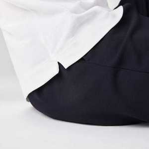 Logo personnalisé brodé coupe normale 100% piqué de coton stretch blanc pour polo patte de boutonnage dissimulée et côtes solides - Product Image 5