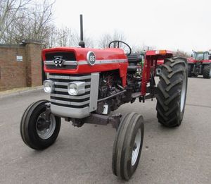Tracteur agricole d'occasion Massey Ferguson 4x4 avec pompe et roulement, moteur Cummins MF 185 - À vendre - Product Image 2