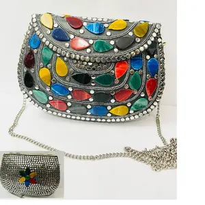 custom made mosaic tribal metal bags with stones and resin embellishments ideal for resale by fashion accessory stores