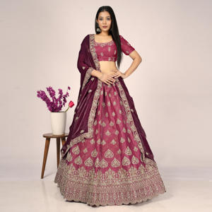 Lehenga Choli brodé de luxe avec des détails de motifs élégants sur toute la surface, un travail de bordure riche et un dupatta doux et fluide - Product Image 3