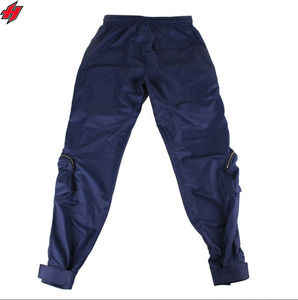 Pantalon coupe-vent de haute qualité avec logo brodé et conception personnalisée Pantalon en nylon en polyester pour hommes Pantalon en nylon à panneaux en bas de vêtements de rue pour hommes - Product Image 6