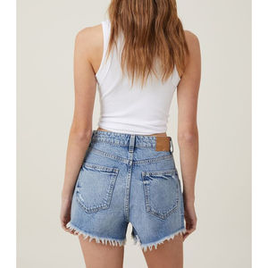 Short en jean bleu de haute qualité pour femmes avec logo, décoration en coton respirant du Pakistan, service OEM - Product Image 6