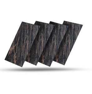 Superficies flameadas y pulidas de granito marrón Tigre Premium para uso interior y exterior Granito marrón Tigre - Product Image 1