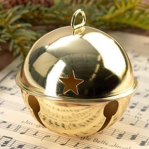 Hanging temple brass cow <b>bells</b> with classic Indian aesthetic for festive use or rustic antique home display accents - Product Image 1