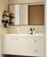 Meuble-lavabo flottant sur mesure avec miroir LED et comptoir monobloc intégré