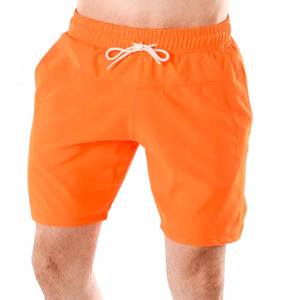 Vente en gros de shorts d'entraînement 100% en polyester de haute qualité avec logo personnalisé poches à panneaux décontracté coupe ample décoration à motif solide - Product Image 1