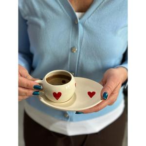 Cuore turco tazza di caffè con piattino