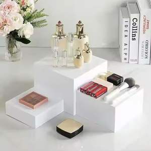 Elegant <b>White</b> <b>Acrylic</b> Display Riser for Showcasing Collectibles and Decorative Items - Product Image 1