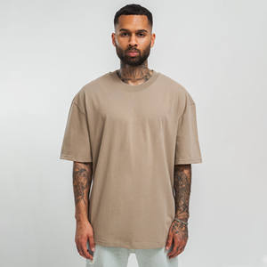 เสื้อยืดผู้ชายทรงโอเวอร์ไซส์ ลายโลโก้ด้านหน้าแบบวินเทจ ผ้าคอตตอน 100% หนานุ่ม ไม่ยับ ทรงโอ-เนค สไตล์ลำลองเท่ๆ - Product Image 1